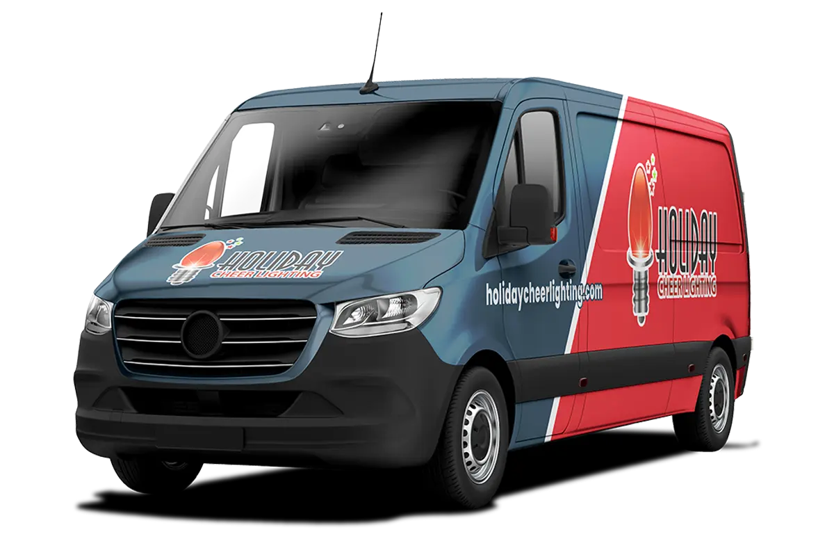 A blue and red van with the "Holiday Cheer Lighting" logo and website address on the side. This van is used for installing permanent holiday lighting.